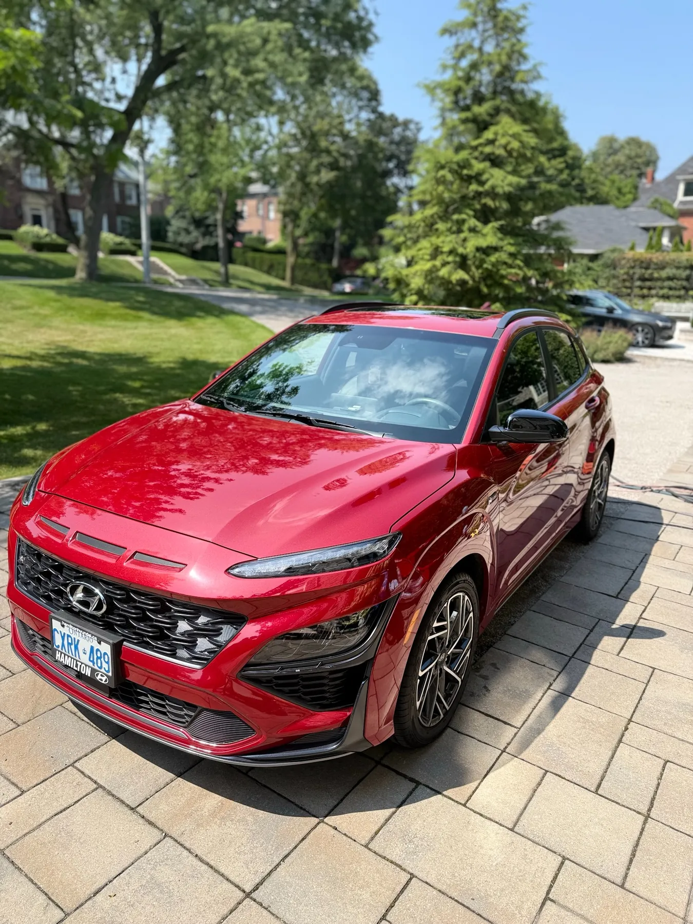 Glossy red Hyundai SUV after exterior detailing