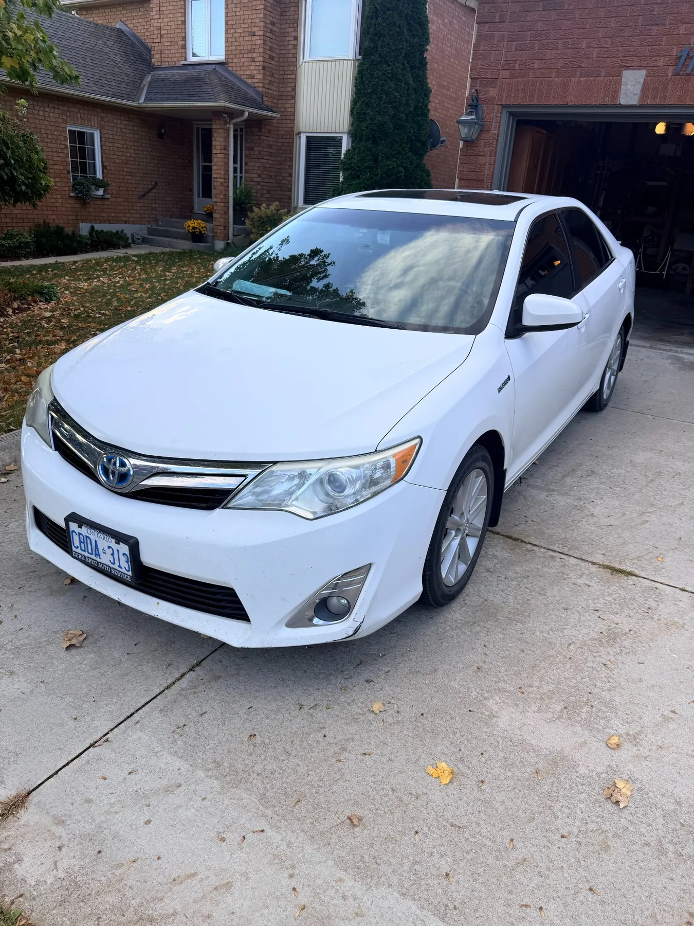 White Toyota Camry Hybrid after detailing
